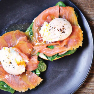 Image of Eggs Benedict that are available from our breakfast menu from The Bagel Co, Rose Bay